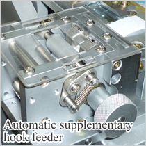 Automatic supplementary hook feeder